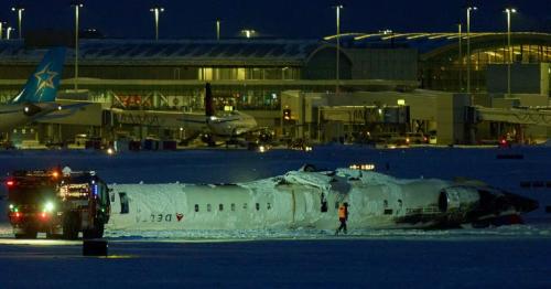 At least 18 injured as Delta plane flips upside down in